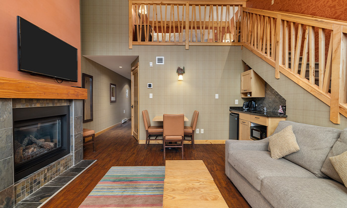 Living room in a Premium Loft Suite at Fox Hotel & Suites in Banff